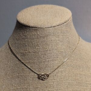 Elegant Avon Gold Tone Knotted Necklace